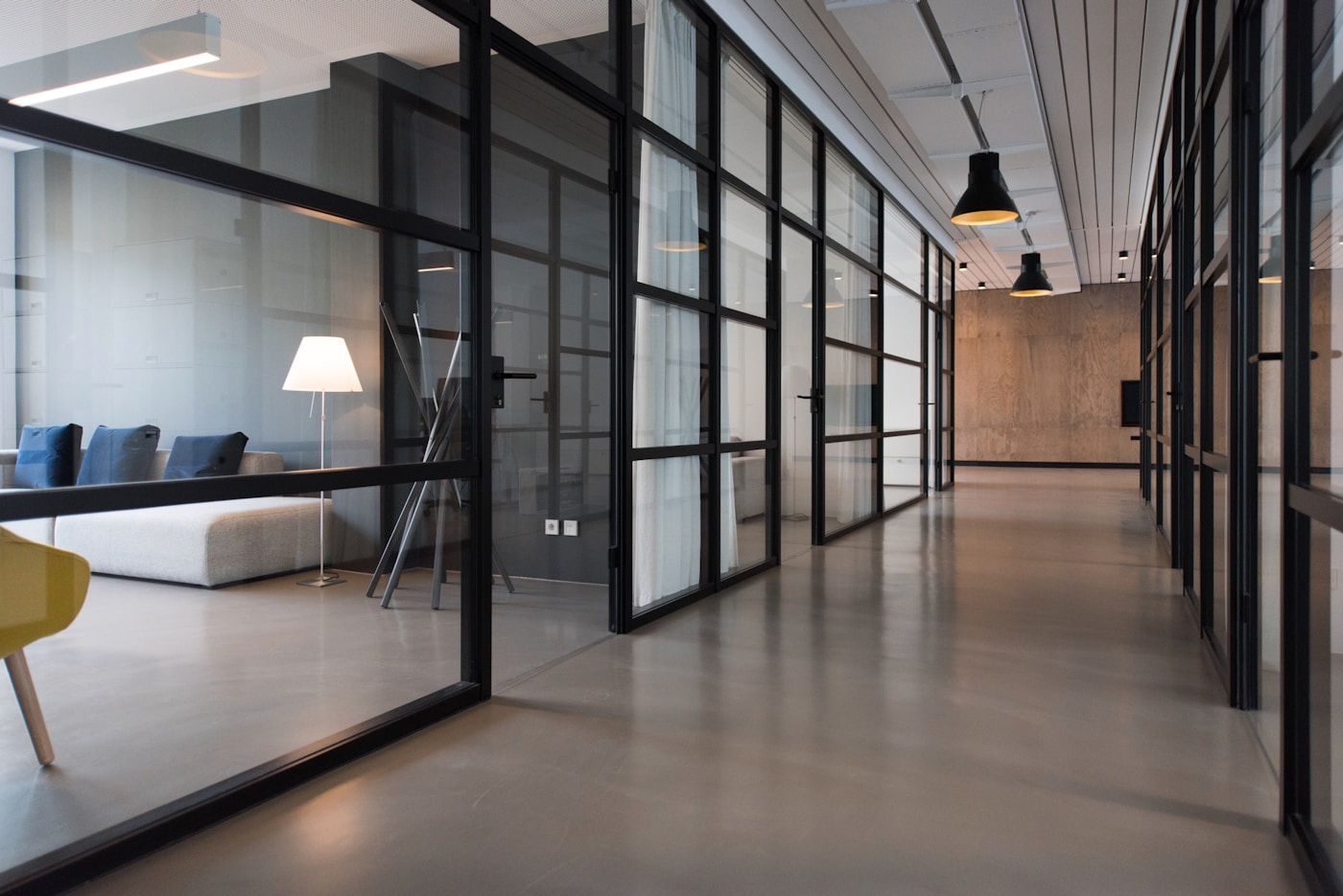 Tower studio workspace with city views at dusk